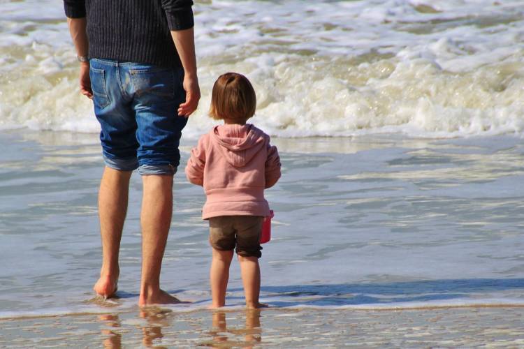 Father and son on the beach