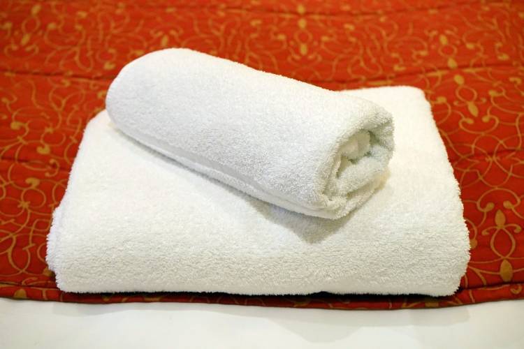 Towels on a bed